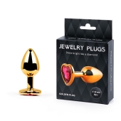 Золотистая анальная пробка с малиновым кристаллом-сердечком - 7 см. - Anal Jewelry Plug - купить с доставкой в Рыбинске